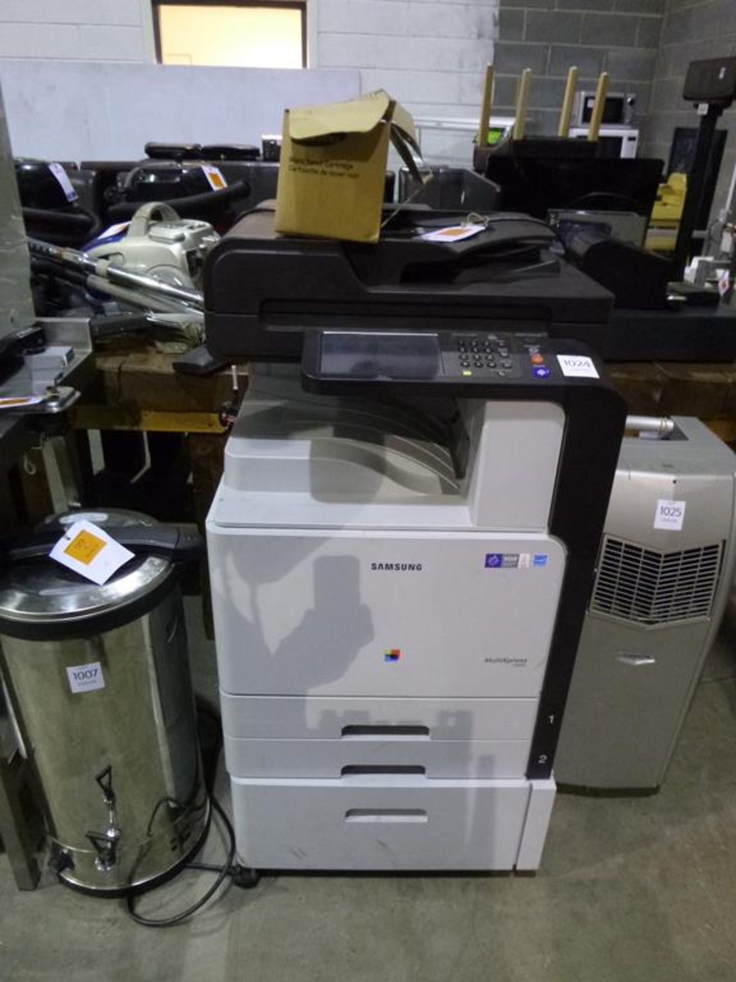 * A Samsung Multixpress C9201 Photocopier. Please Note: There is a £5 plus VAT lift out fee on