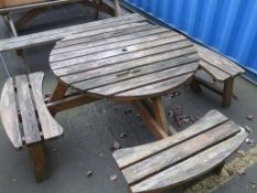 * A Round Wooden 4 Seat table. Please Note: There is a £5 plus VAT lift out fee on this lot