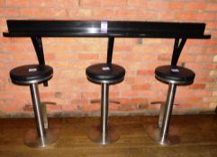 Black granite shelf to wall, and 3 x brushed steel high stools