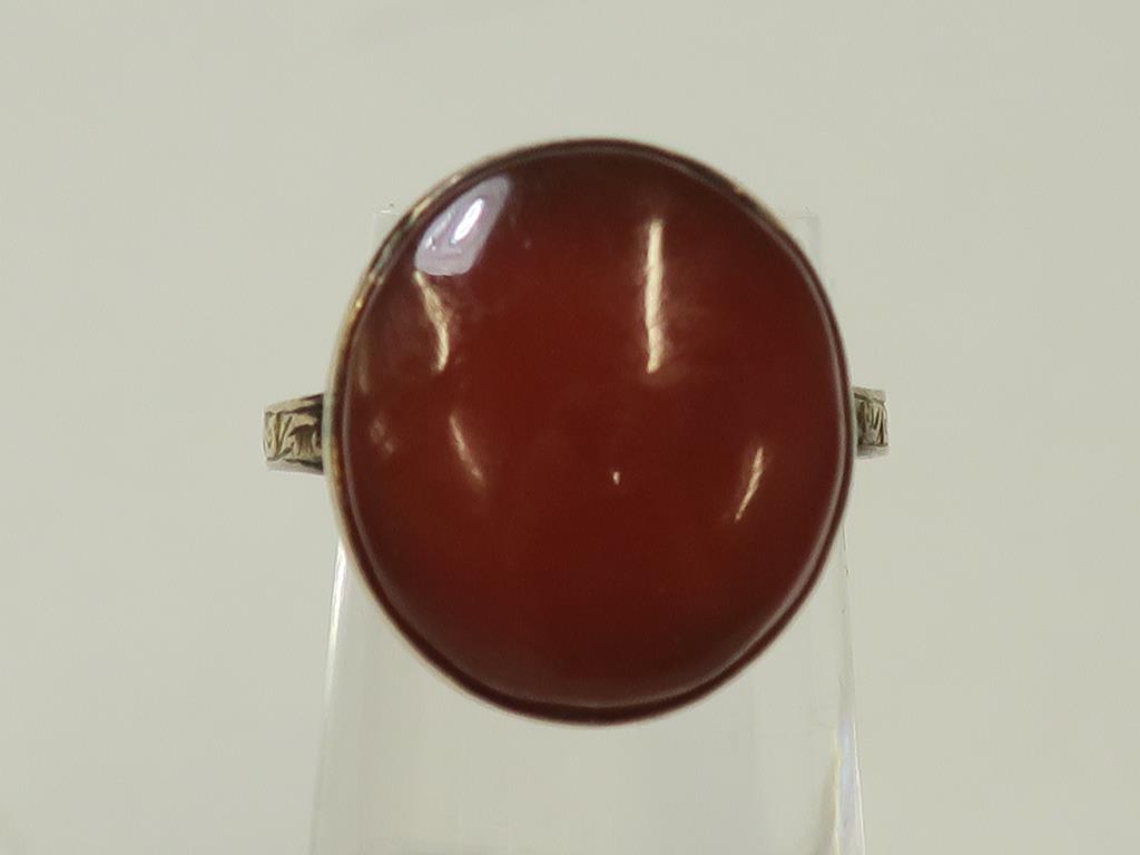 This is a Timed Online Auction on Bidspotter.co.uk, Click here to bid. A Cornelian Set Ring with