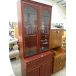 This is a Timed Online Auction on Bidspotter.co.uk, Click here to bid. A modern tall Display Cabinet