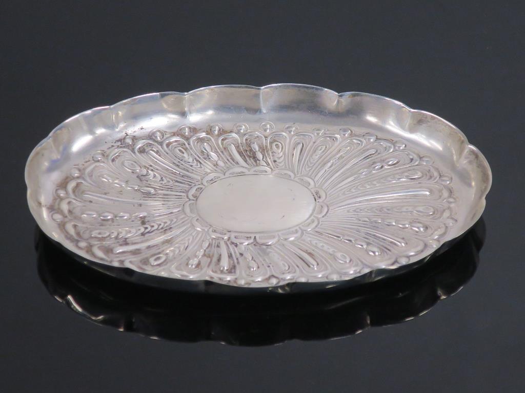 This is a Timed Online Auction on Bidspotter.co.uk, Click here to bid. An Embossed Antique Silver