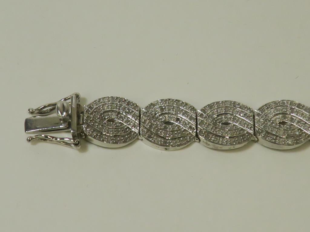 This is a Timed Online Auction on Bidspotter.co.uk, Click here to bid. A Multi Diamond Encrusted - Image 2 of 5