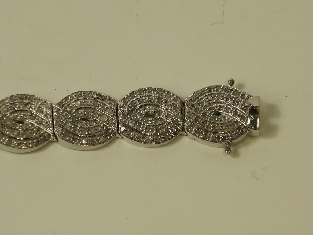 This is a Timed Online Auction on Bidspotter.co.uk, Click here to bid. A Multi Diamond Encrusted - Image 3 of 5