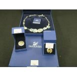 This is a Timed Online Auction on Bidspotter.co.uk, Click here to bid. A Swarovski Necklace together