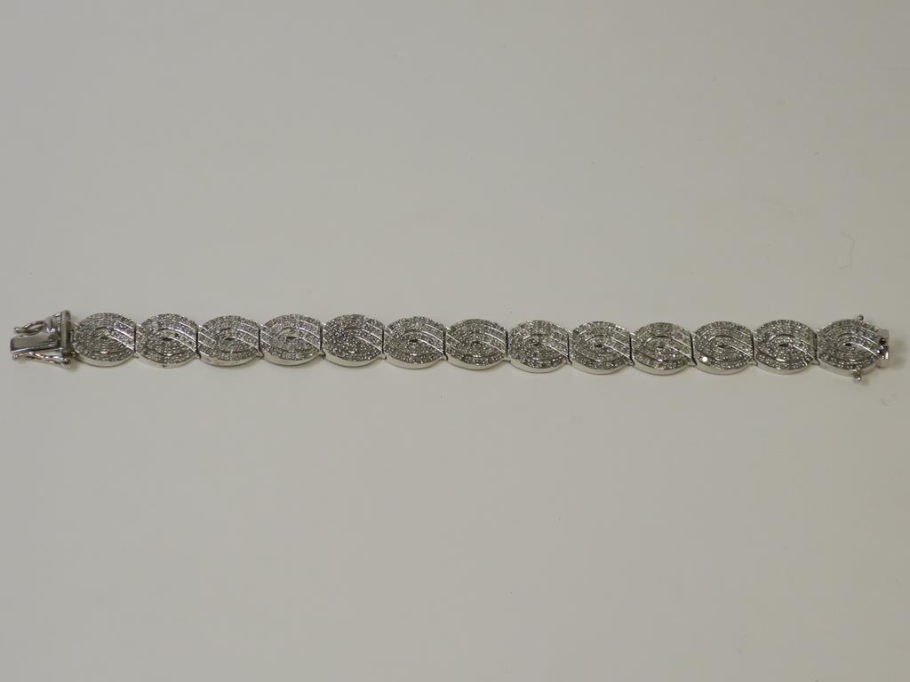 This is a Timed Online Auction on Bidspotter.co.uk, Click here to bid. A Multi Diamond Encrusted