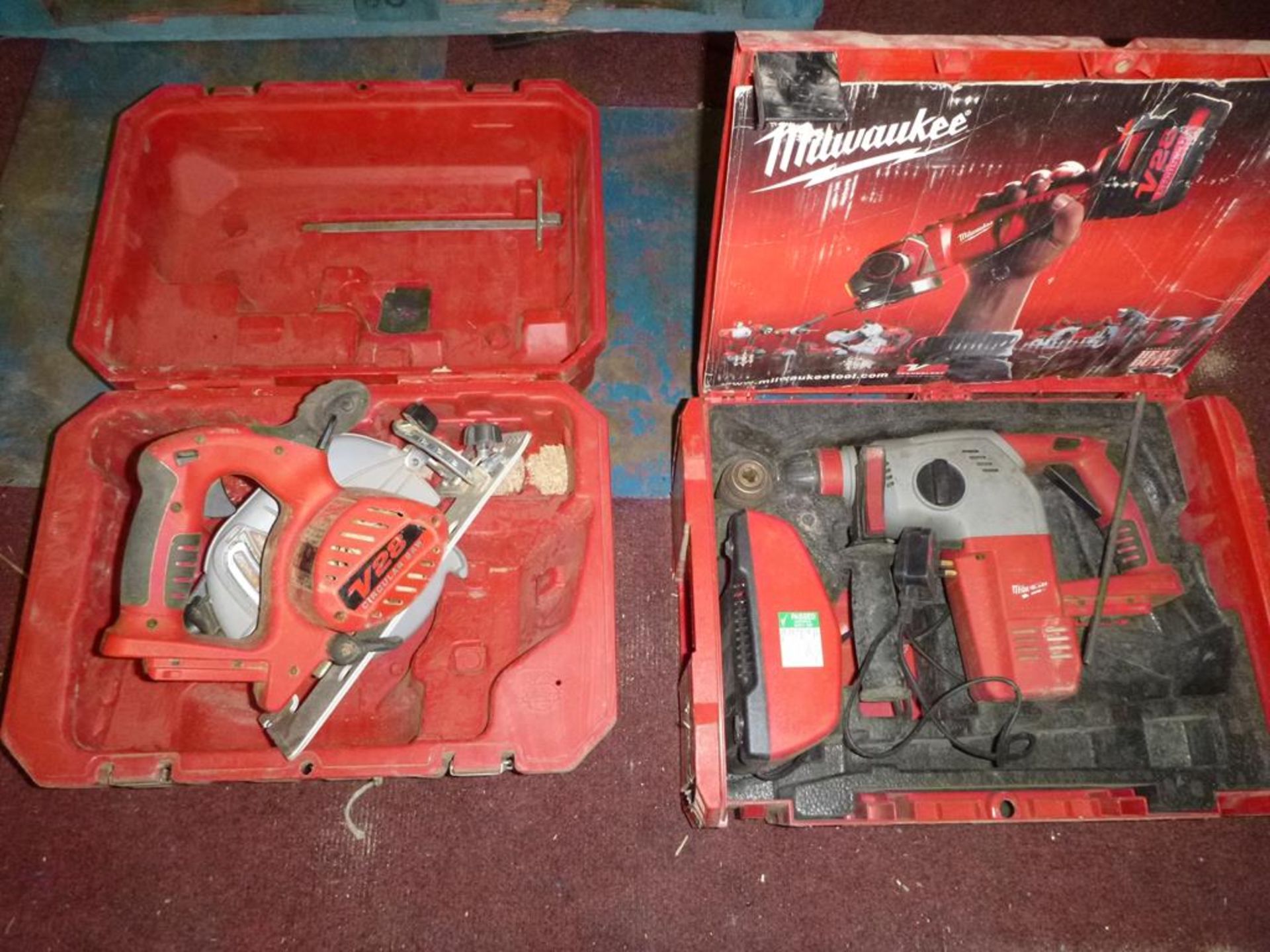 * Milwaukee Battery Powered Drill and a Saw no batteries one Charger