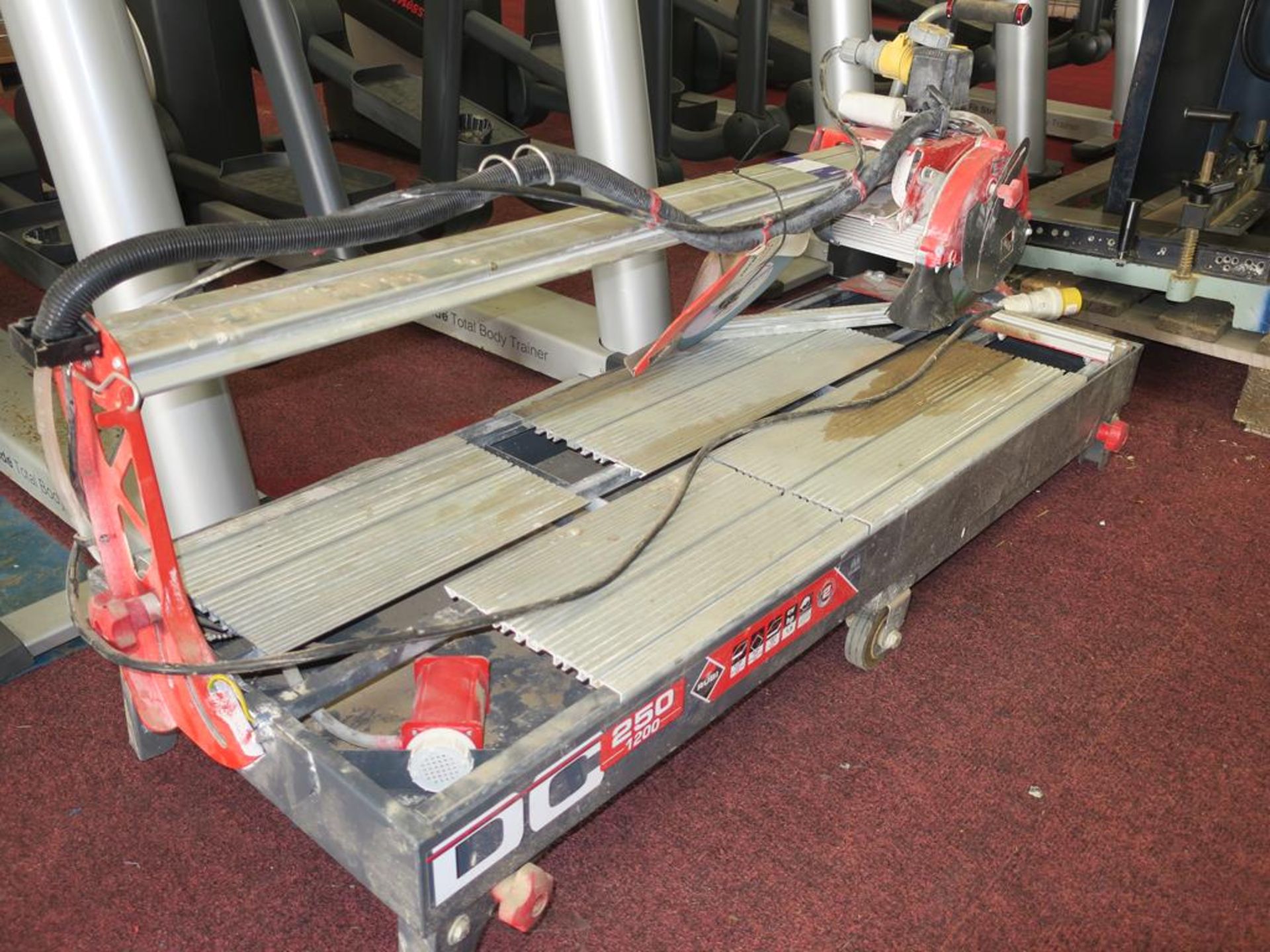 * Rubi DC 250 1200 110V Tile Cutter. Please note there is a £10 Plus VAT Lift Out Fee on this lot - Image 2 of 3