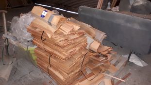 Assortment of cedar shingles and ridges to pallet