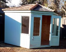 9ft x 7ft Corner summerhouse with cedar shingle roof. RRP £3,400. *Purchaser responsible for