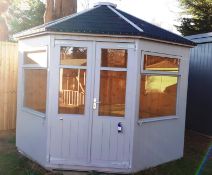 7ft Corner summerhouse with felt tiled roof and glazed windows. RRP £2,200. *Purchaser responsible