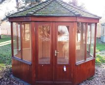 9ft Cedar wood octagonal summerhouse, with cedar shingle roof, glazed windows and timber floor.