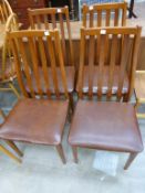 A Set of Four Modern Rail Back Single Dining Chairs with Faux Leather Upholstered Seats (est £20-£