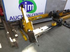 * An FKI Bradbury 2 Post Vehicle Lift (disassembled) Model No 2103; capacity 2500Kg; S/N 2103/14447;