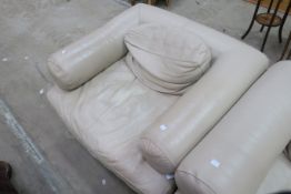 A Large Plain Fawn Leather Single Armchair (est £50-£100)