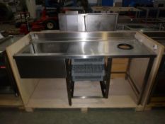 * A Nayati Preparation Sink Unit, draining sink to the left and waste disposal hole to the right,