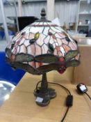 A Tiffany Table/Bedside Lamp (est £40-£60)