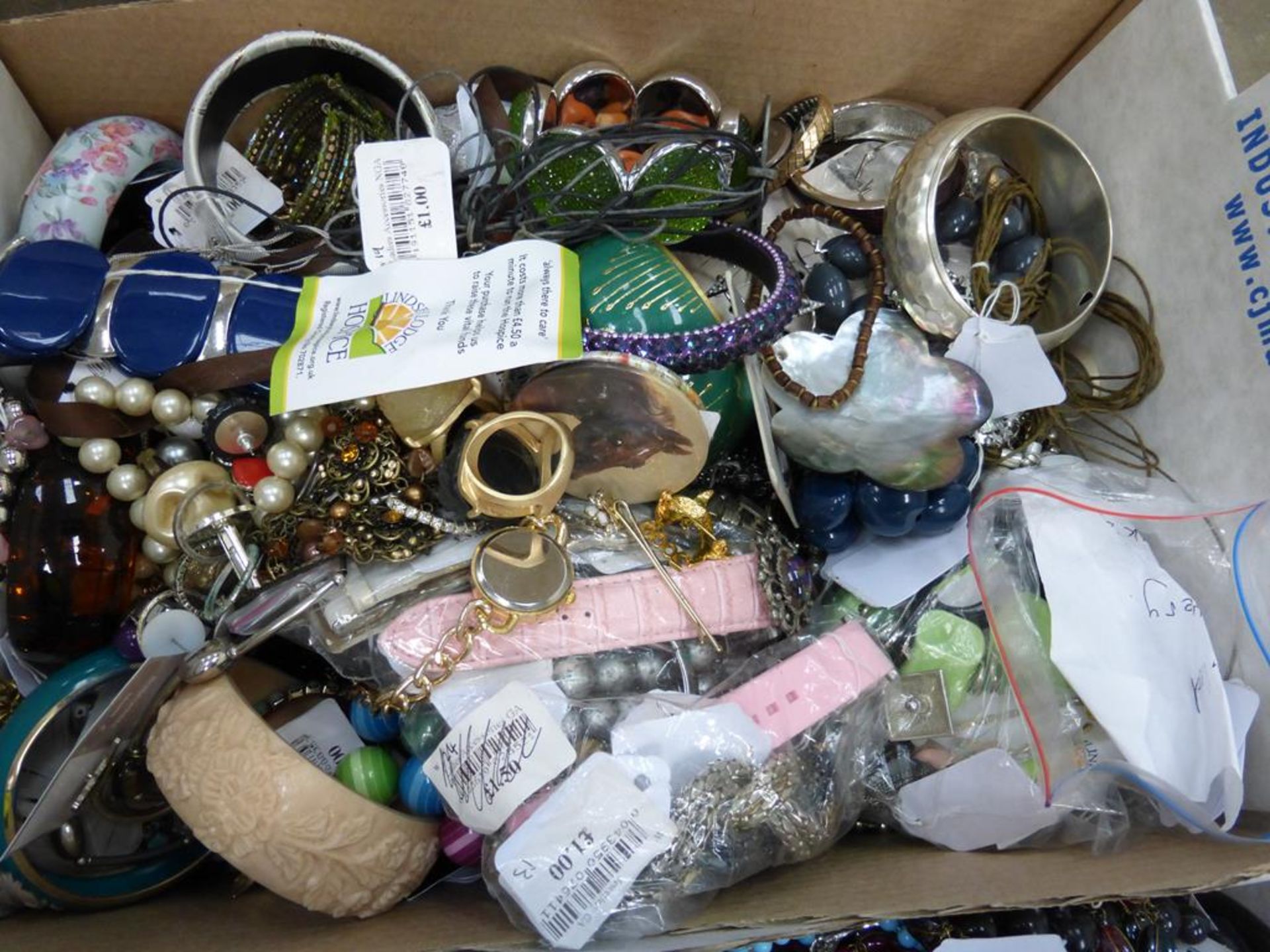 A box of Costume Jewellery. This lot is being sold on behalf of a charity without reserve or