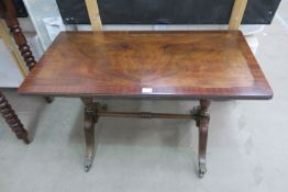 A Reproduction Georgian design Mahogany Rectangular Coffee Table with Splayed Supports and Turned