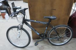 A Reflex 26 Free Climb FS Mountain Bicycle with Shimano 6 wheel cogs and 3 pedal gears (18 gear