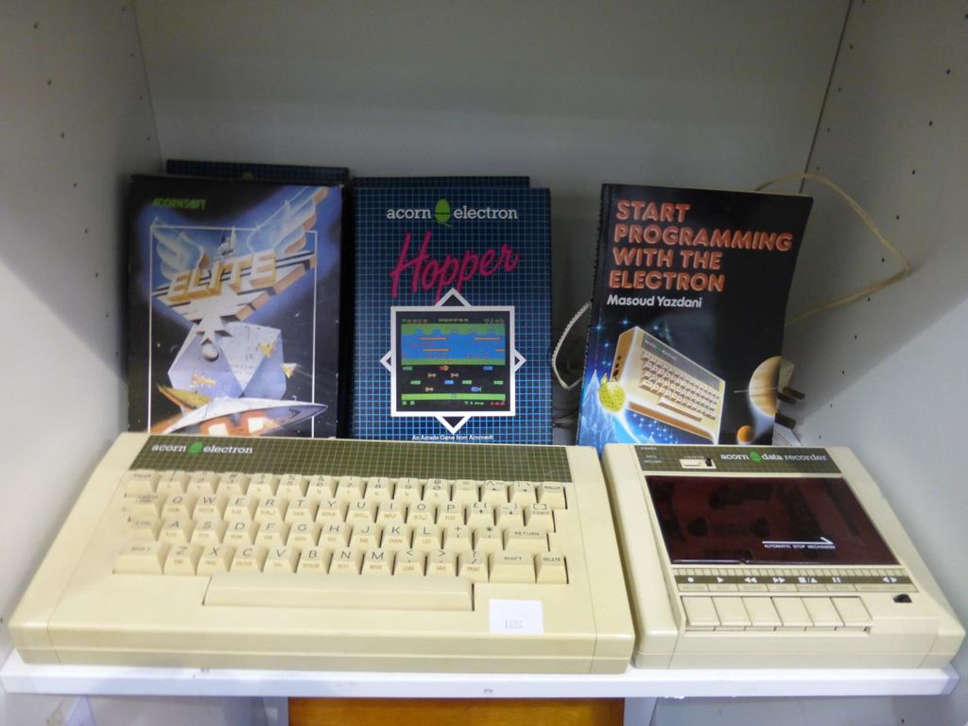 A 1980's ''Acorn Electron'' Early Computer System with data recorder, games and manual (est £50-£