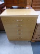 An Oak effect Straight Front Chest of Five long Drawers 77cms (est £20-£40)