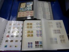 Large collection of Canadian Stamps in three Albums. Mainly Mint Blocks (est £60-£90)