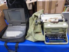 A 66 Imperial 66 Type Writer with Case together with a Laptop in Case (est £20-£40)