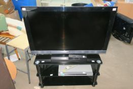 A Sony Bravia LCD Digital Colour TV Model KDL - 37EX401 with remote control (both in working