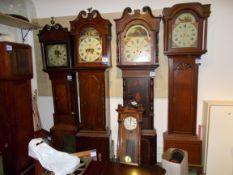 Assortment of clocks in need of repair