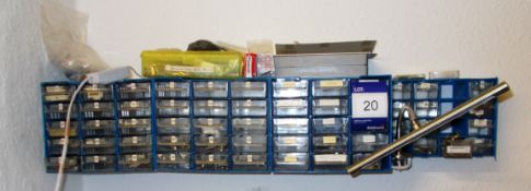 4 x plastic wall racks and contents