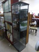 * A tall Glass Panelled Display Cabinet (H164cm, W43cm, D37cm)
