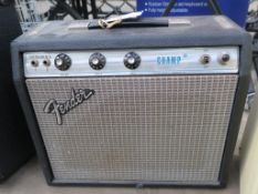 * A Fender Silver Face Champ Amplifier (Orange and Silver Grill Cloth; 1976-1980?) (speaker 3.2ohms,