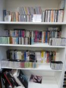 * Four shelves containing Musical Media, including DVD's, CD's, VHS Tapes etc, also comes with