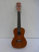 * A new boxed Laka Mahogany Electro Acoustic Concert Ukulele (RRP £110)