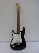 * A new boxed Cruzer by Crafter left handed Electric Guitar (serial No 359974) in Black and White