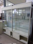 * Two Large Glass Panelled Illuminated Display Units (H198cm, W198cm, D41cm) together with a smaller