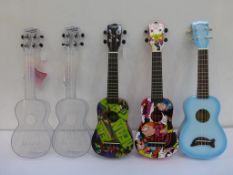 * A total of five Ukulele new boxed to include two Transparent Water Resistant Makala Waterman (