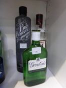 * A Bottle of Bols Genever, a Bottle of Beefeater 24 London Dry Gin and a Bottle of Gordon's Gin