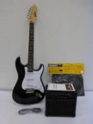 * A new boxed Encore Electric Guitar in Black together with a Kinsman Instrument Bag and a Kinsman