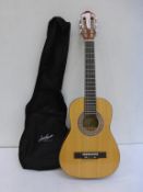 * A new boxed Jose Ferrer Classic Student 1/2 Guitar Model 5208C (RRP £75)
