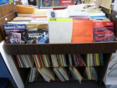 Ten divided shelves of music themed literature to include ''Antonio Vivaldi the Four Seasons, in
