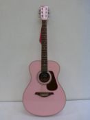 * A Pink Vintage Guitar with soft carry case Model V300PK (RRP £169)