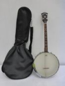 * A used boxed Heartwood Tenor Banjo with Irish Tuning G, D, A, E in faux leather carry bag (RRP £