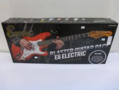 * A new boxed Encore Blaster Guitar Pack, E6 Electric. Includes E6 Blaster Guitar, 10 Watt Amp,