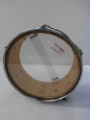 * A Red Performance Percussion Snare Drum with clear 'Plus' heads (diameter 31.5cm) (RRP £40)