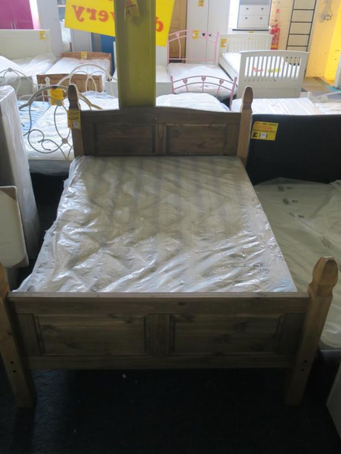* A Corona Double Bed Frame Together with a Double Orthopedic Mattress