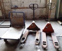 2 x pallet trucks and 1 flatbed trolley