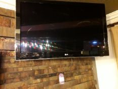 LG flat screen TV with wallmount bracket