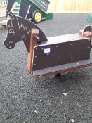 Children’s play area wooden rocking horse, embedde